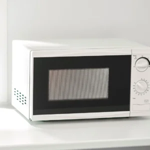 Forno a microonde compatto per la cucina di una cabina da cantiere